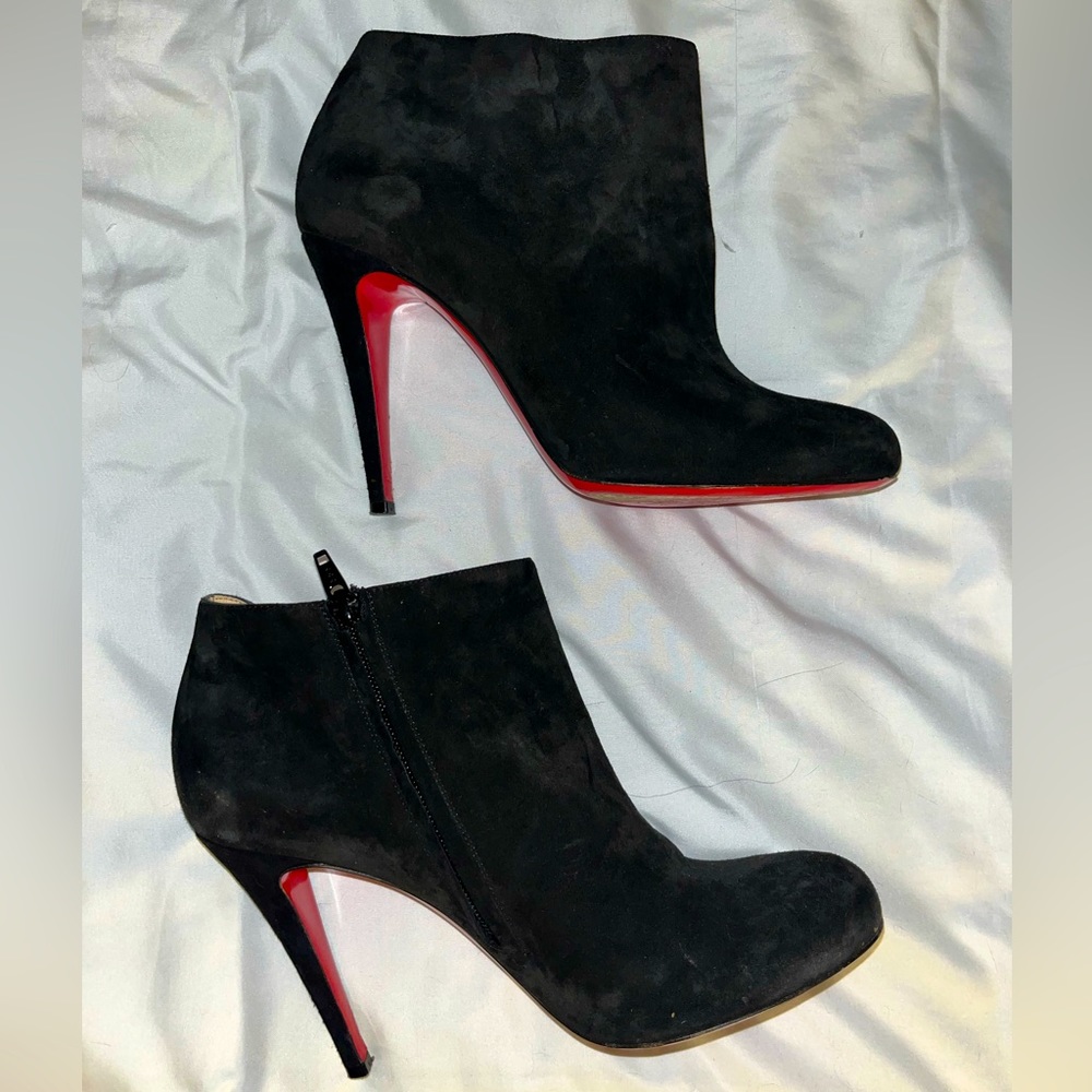 Christian Louboutin black suede booties.